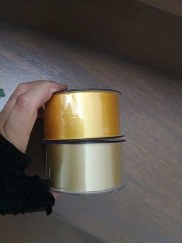 [A-019190] Bedrukt lint Geel Goud 70 mm met gouden opdruk 80 cm per stuk