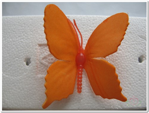 Vlinders van foam Oranje 6 cm Doos 36 stuks voor bloemschikken en decoratie