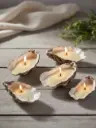 oesterschelp lichtgele kaarsen.webp