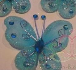 Vlinder Turq Blauw met diamantjes 5 cm Bruidsdeco 