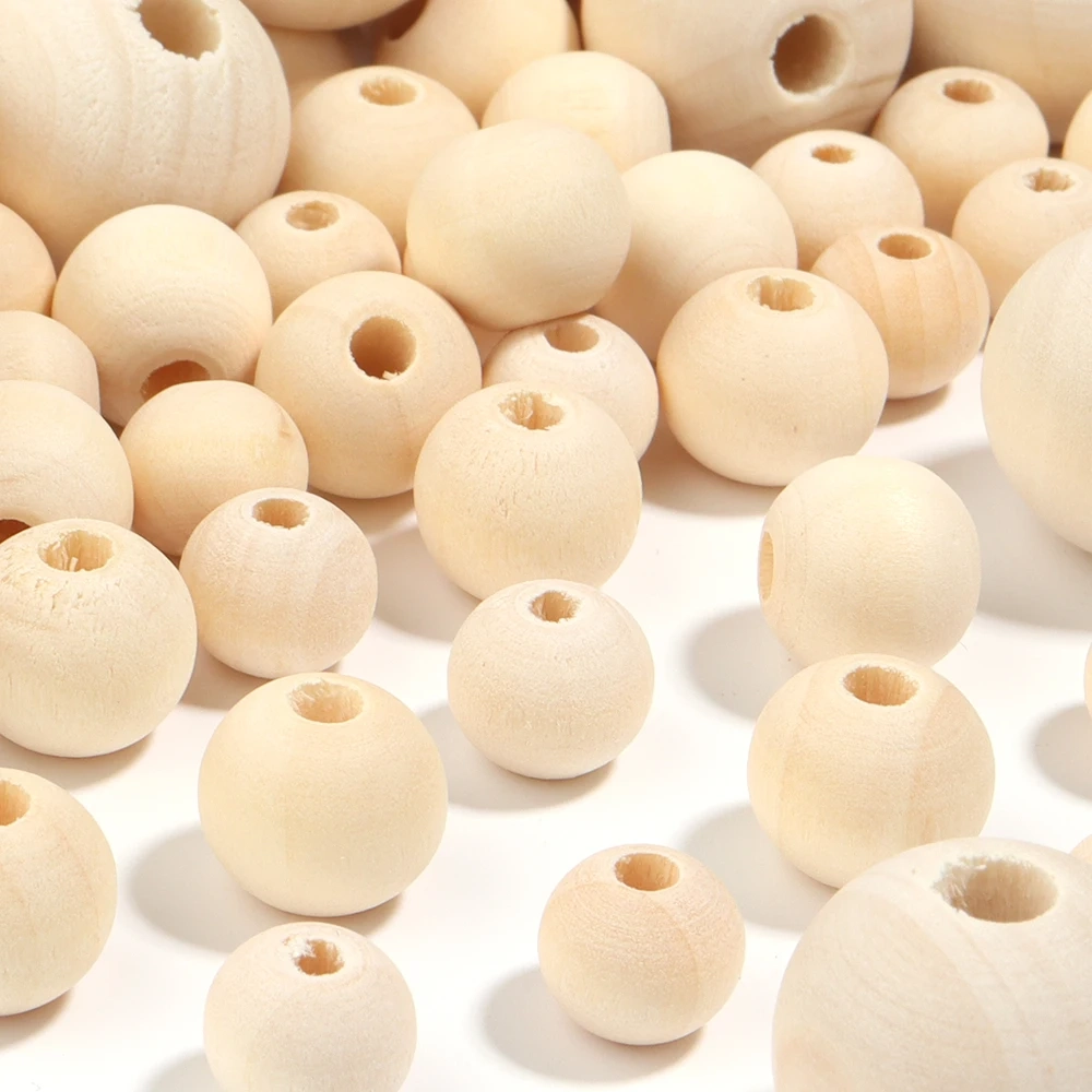 Houten kralen gepolijst 8 mm zakje +/- 100 stuks