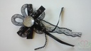 Corsage Zwarte corsage met speld 
