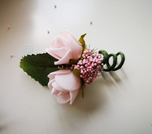 Corsage Simply OudRoze en blaadje Maatwerk