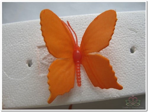 [A-009310] Vlinders van foam Oranje 6 cm Doos 36 stuks